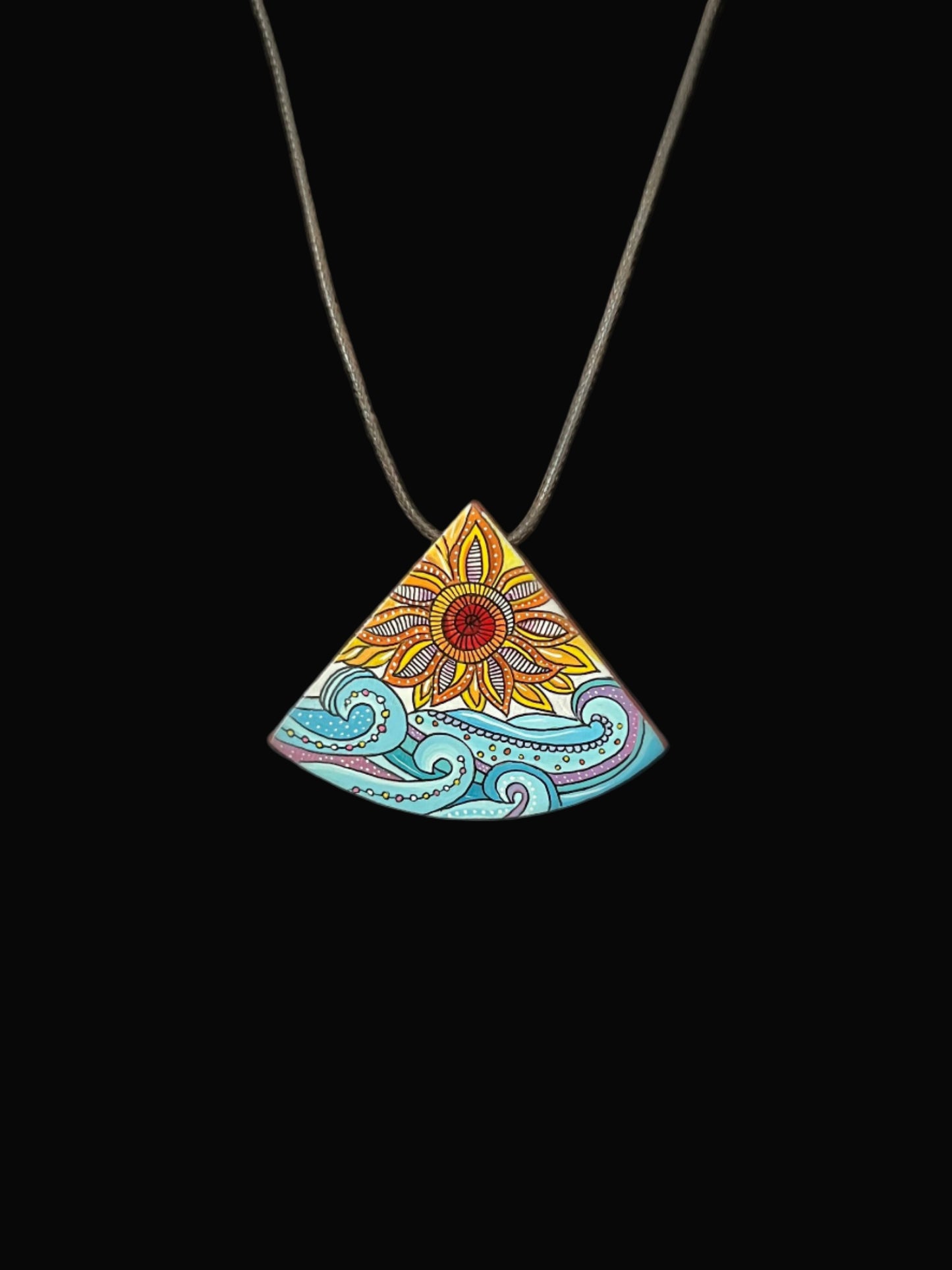 Colorful triangular pendant with floral design