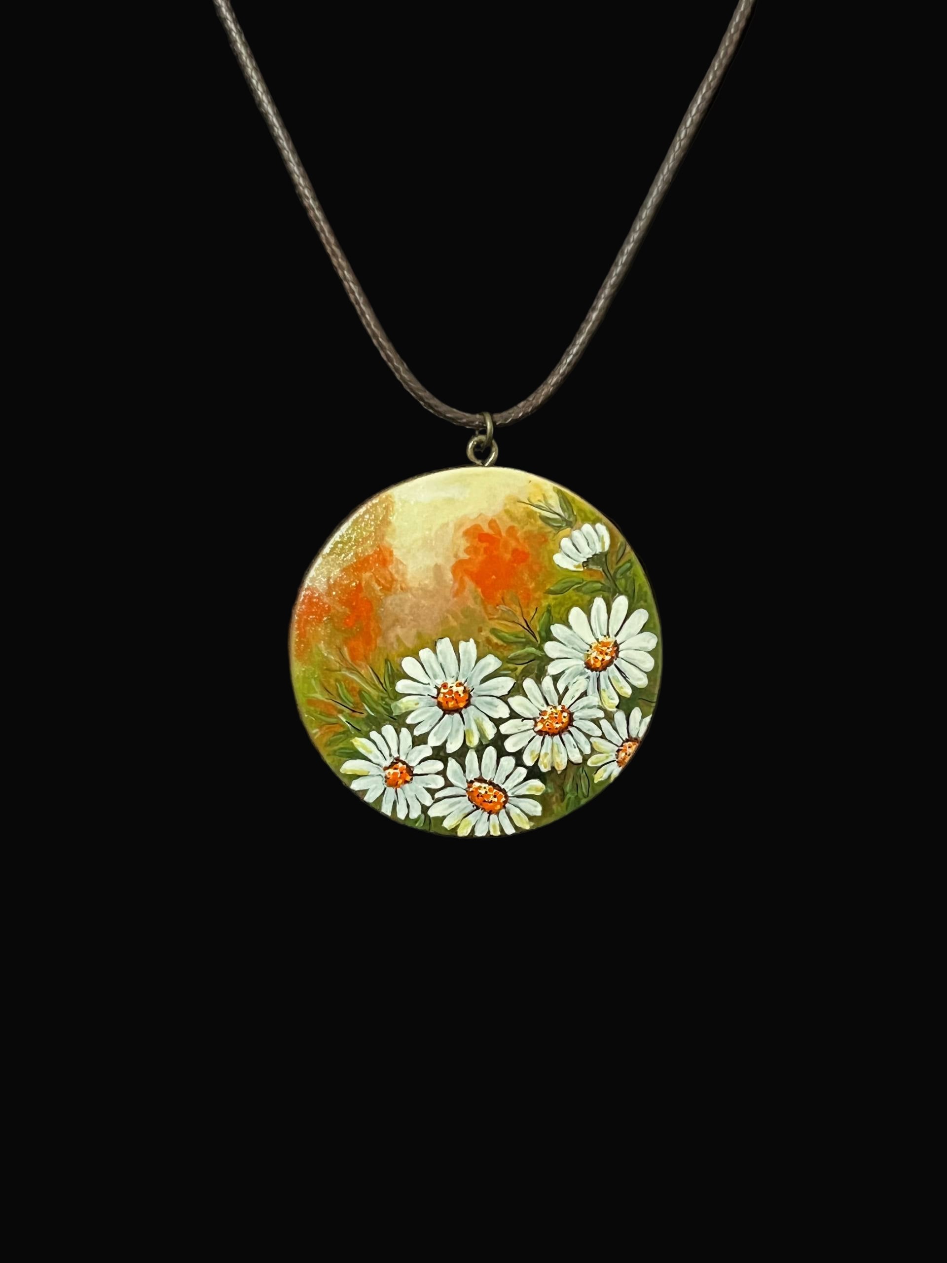Round pendant with floral design
